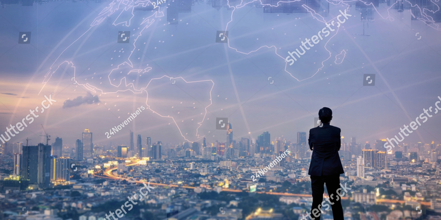 stock-photo-vision-concept-successful-businessman-standing-with-hands-crossed-on-chest-on-top-of-building-and-1025018239_copy_1500x750